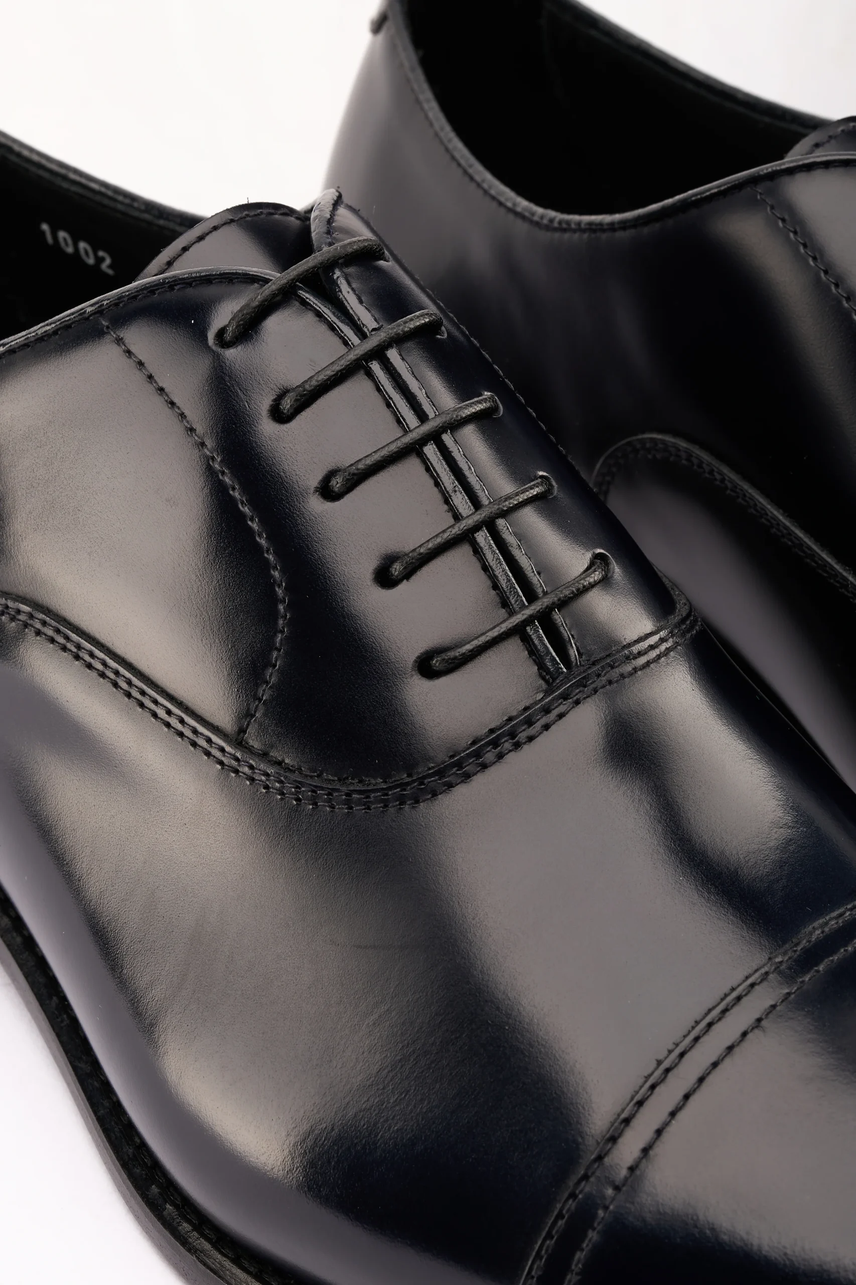 Stringata in pelle blu - immagine 4